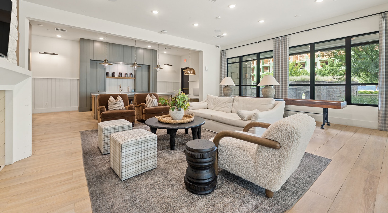 room with couch chairs and coffee table