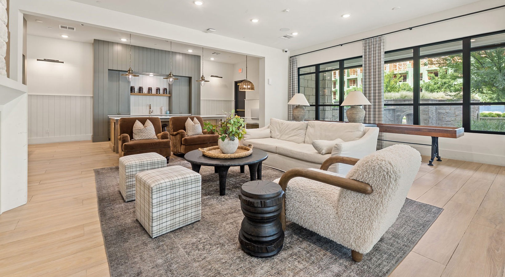 room with couch chairs and coffee table